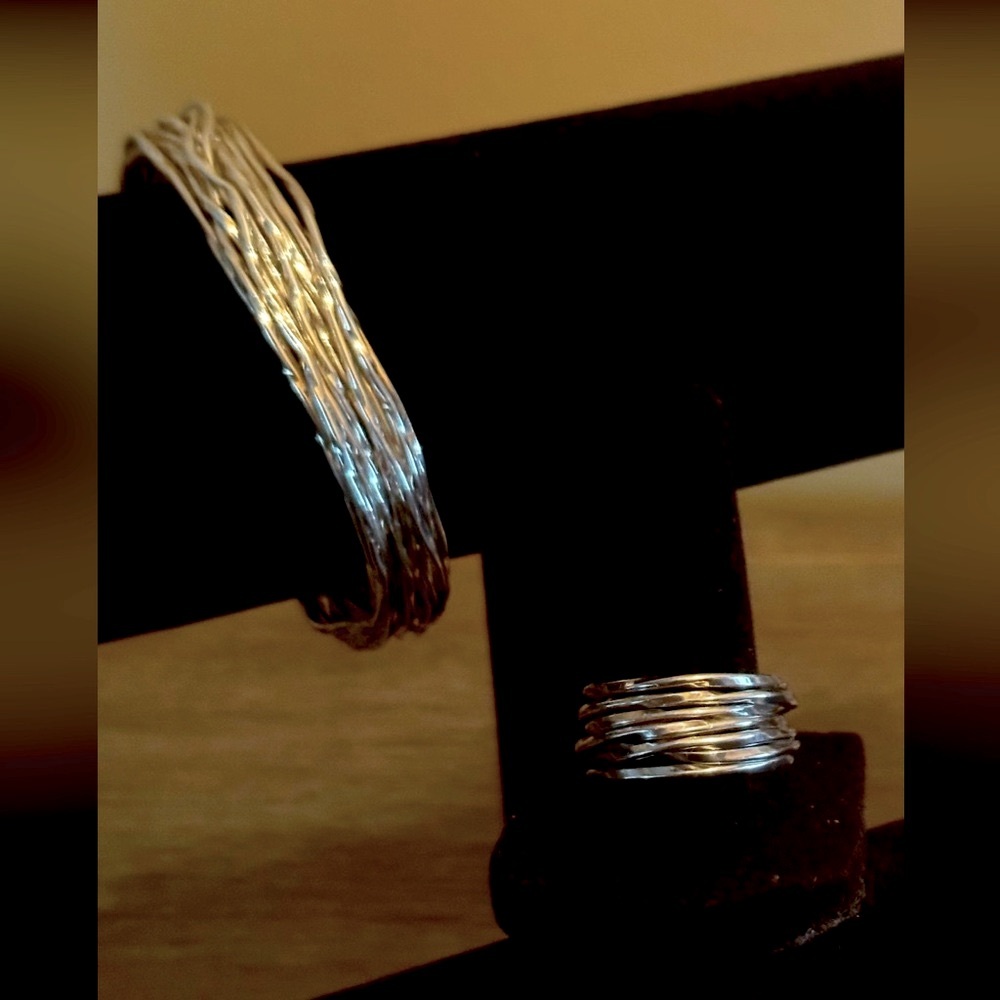 Set of silver woven open bangle and ring